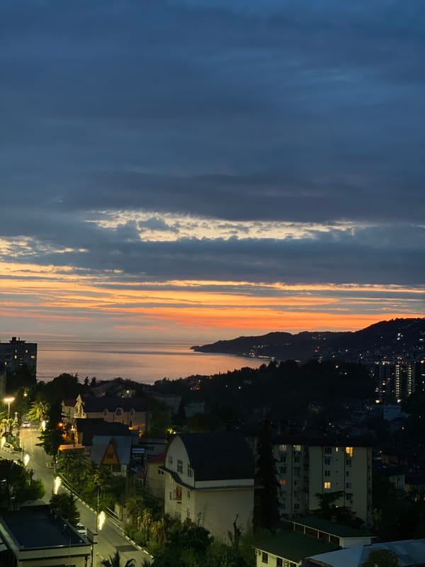Twilight cityscape photographed from high vantage point in Sochi