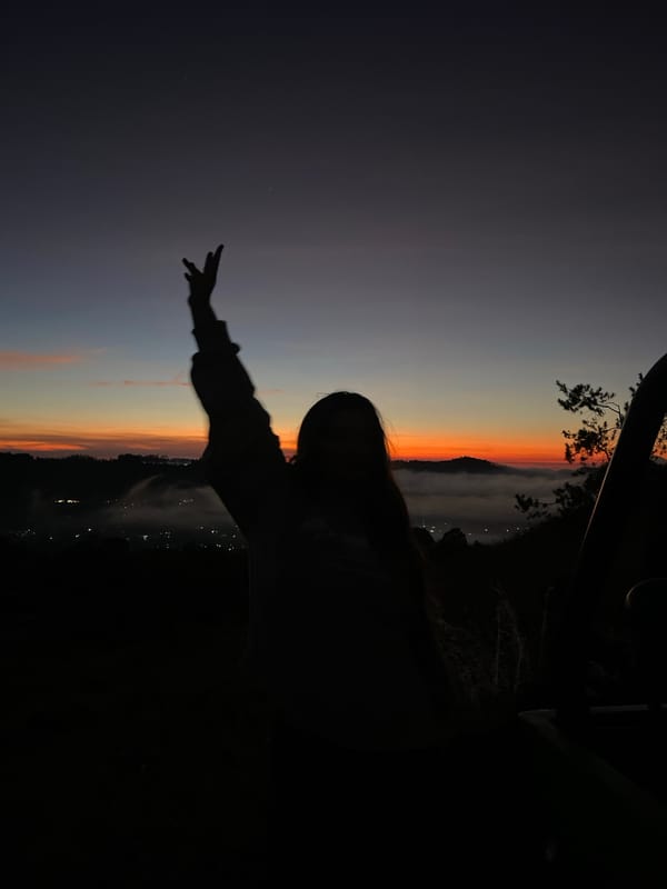 Volcanic sunrise over Kintamani, fog in the valley below