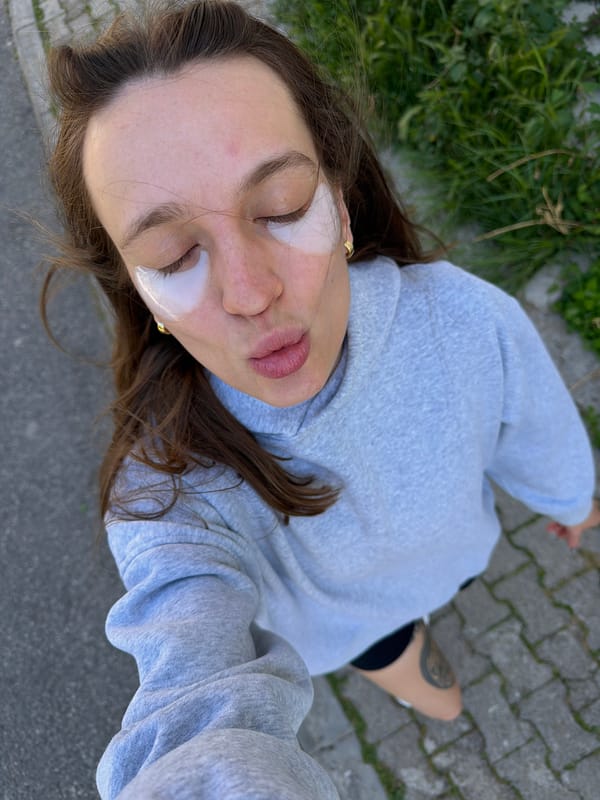 Woman films selfie content around Budva, Montenegro with dog