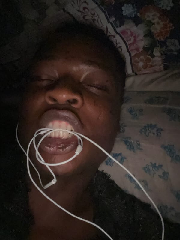 Person resting with earbuds captured in 22 sequential memories
