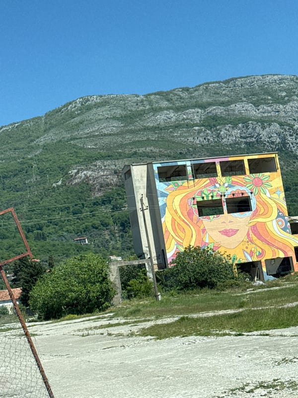 Colorful mural spotted on abandoned building in Buljarica, Montenegro