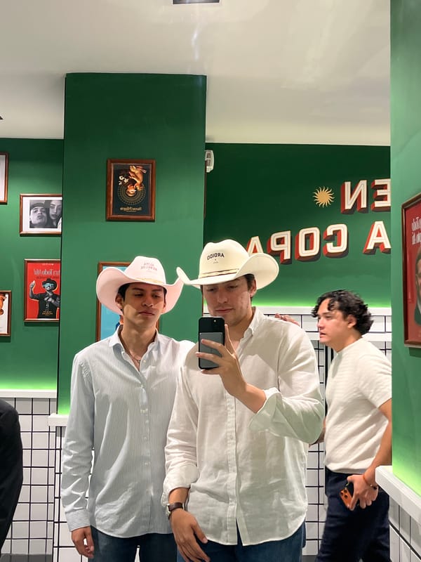 Three people take early morning selfie in Puebla