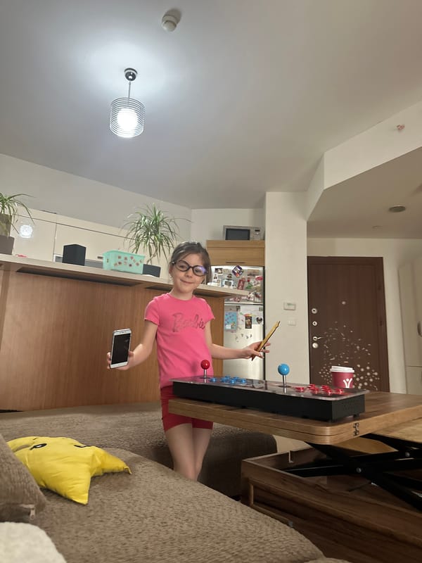 Woman enjoys morning coffee and pastries with children in Istanbul