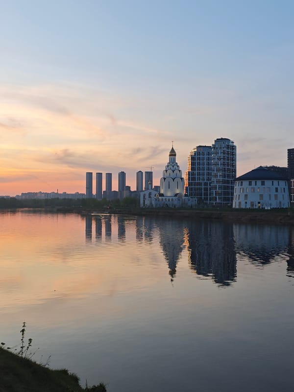 Urban waterscape scene captured during twilight hours