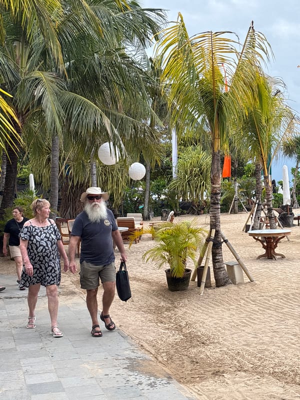 Morning beach walk activity observed in Denpasar, Indonesia