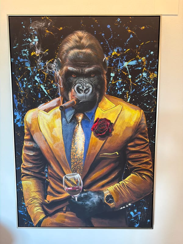 Art displays featuring gorilla painting, skull containers observed Lenzburg