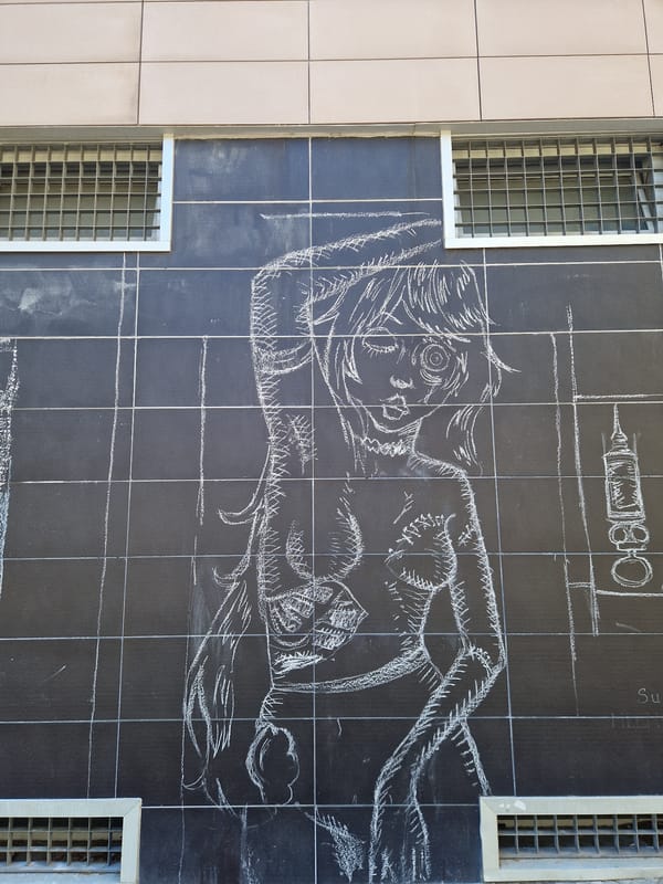 Chalk street art spotted on Barcelona wall