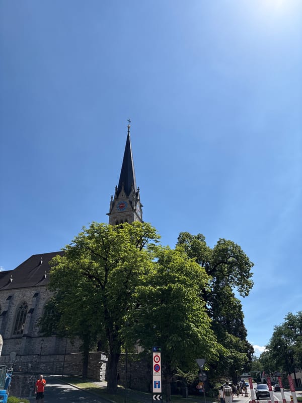 Vaduz city center on a sunny afternoon, umbrellas and landmarks