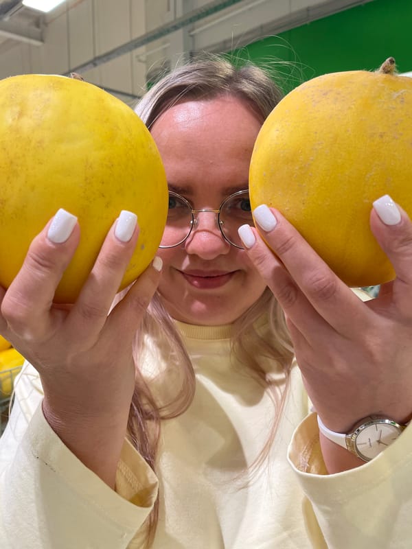 Playful produce posing during a Vologda grocery run