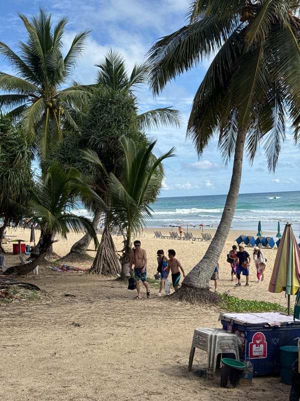 Karon Beach morning: shoreline activity and quiet streets