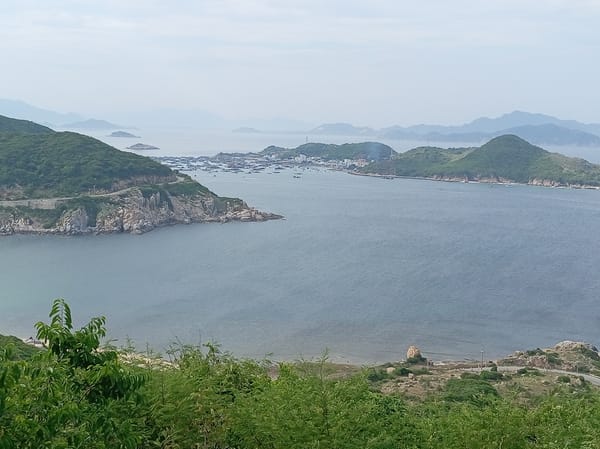 Cam Ranh Bay's calm harbor dotted with boats