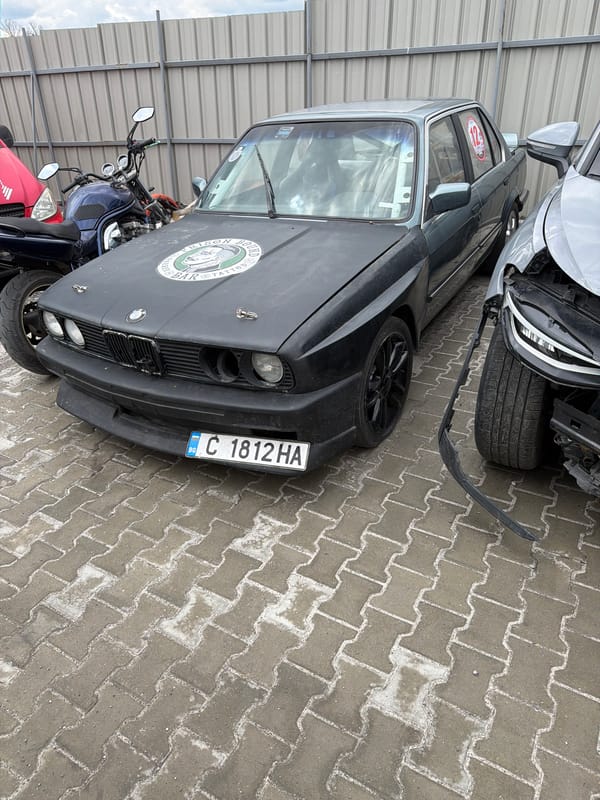 Vehicles parked at Sofia repair facility or junkyard