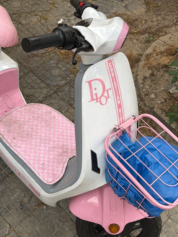 Pink-accented electric scooter spotted parked in Đà Nẵng
