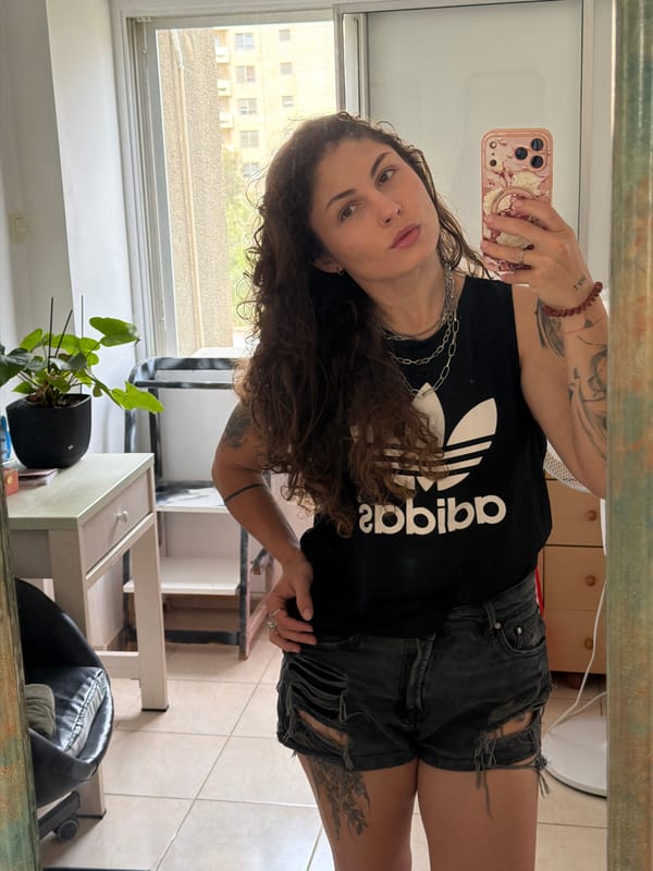 Woman takes morning selfies in Kiryat Bialik bathroom mirror