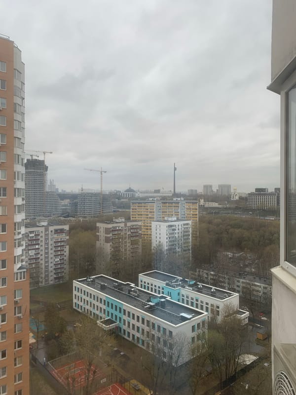 Overcast day photographed over Moscow's dense residential landscape