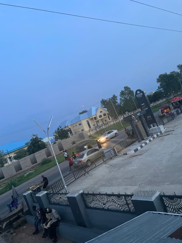 Jalingo street life at dusk, mixed with motivational quote posts