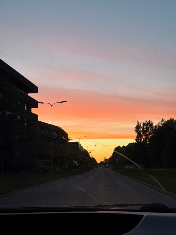 Driver captures vibrant sunset colors while traveling through Tallinn