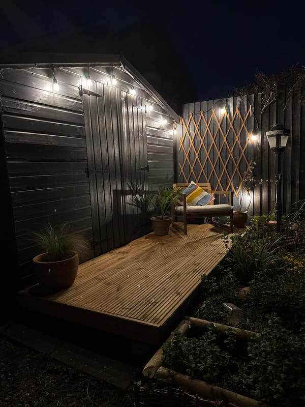 Evening outdoor space illuminated by decorative lights in South Kesteven