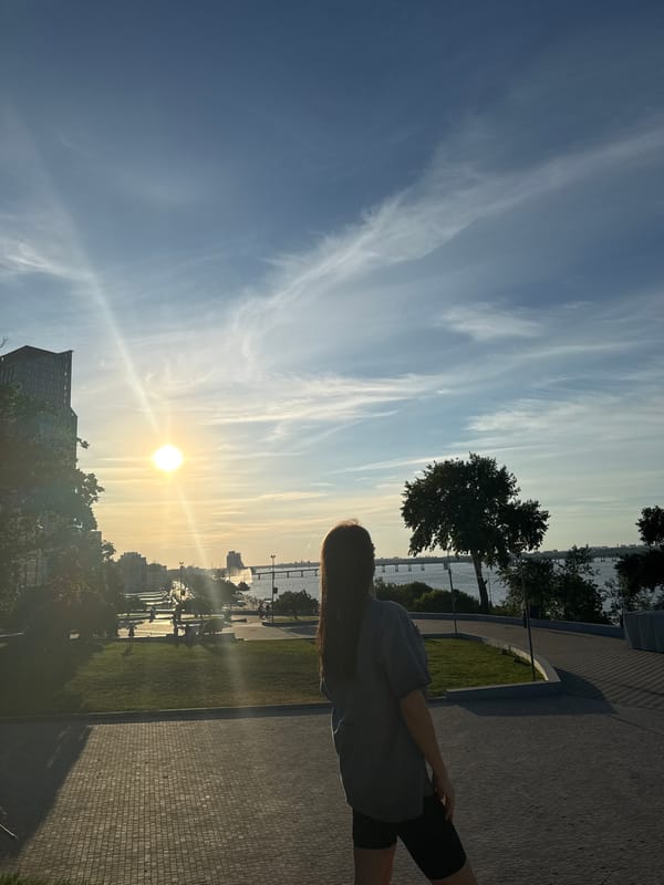 Golden hour along the Dnipro River embankment, summer 2026