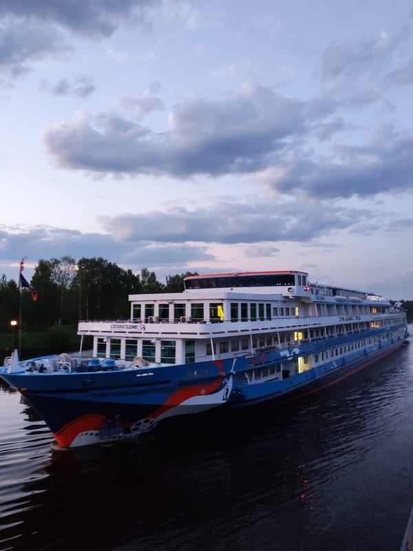 Cruise ship travels Moscow Canal near Zaprudnya at dusk