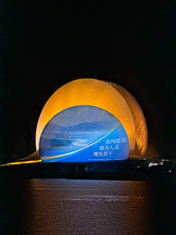 Zhuhai Grand Theatre displays nighttime digital projections on golden dome