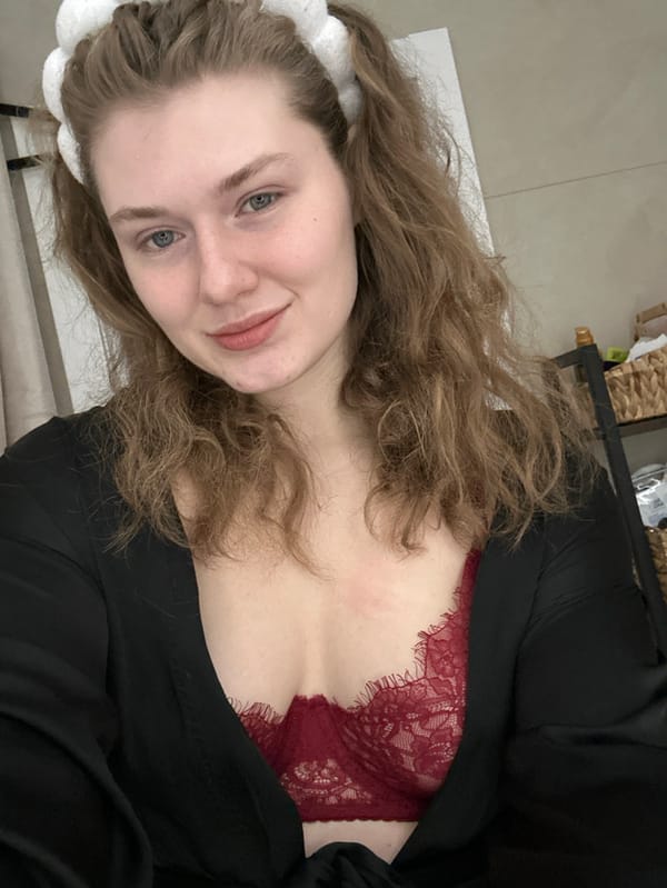 Woman documents evening beauty routine in Kazan bathroom