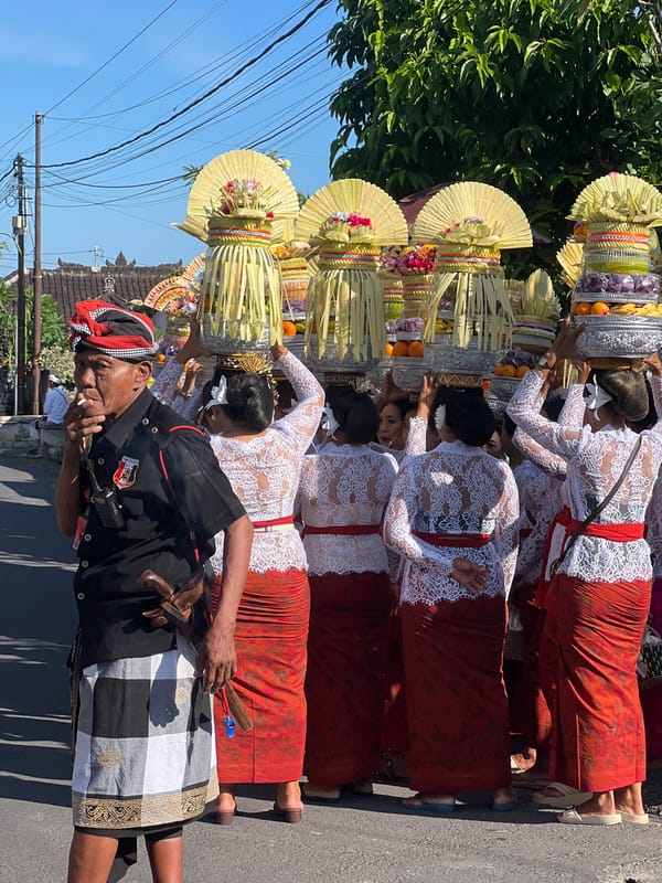 Traditional Balinese procession moves through Sukawati streets