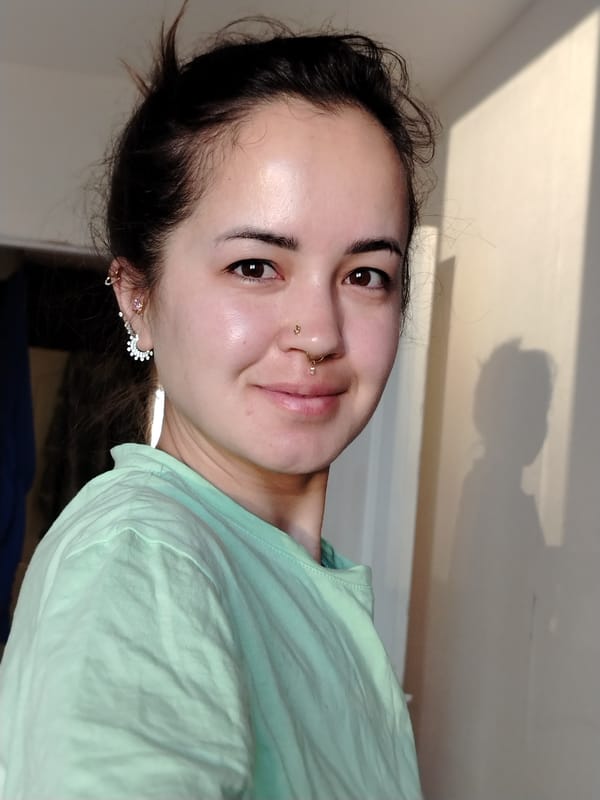 Woman photographed in bedroom in Noviy, Russia