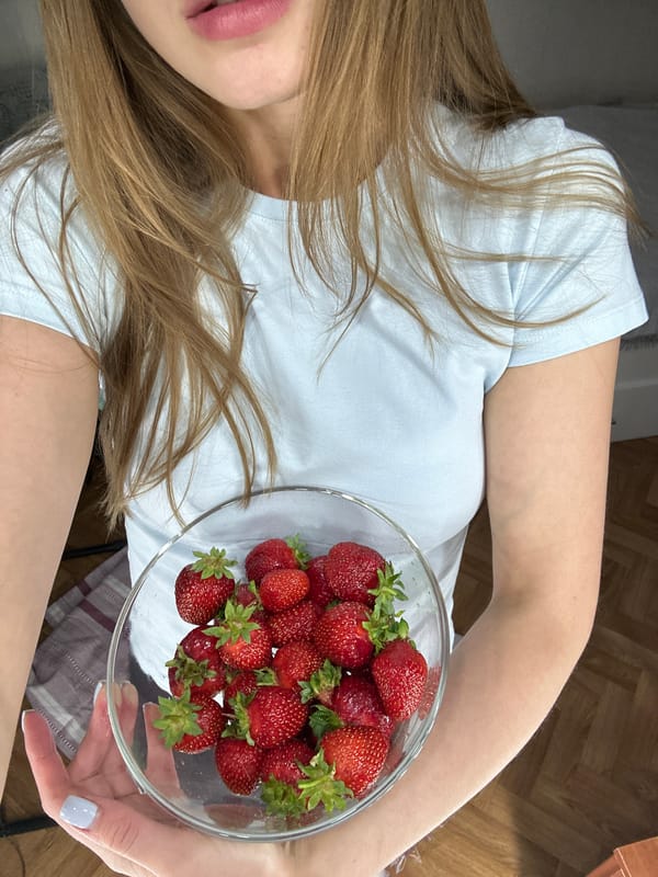 Lazy afternoon strawberry shoot on a striped blanket in Khimki