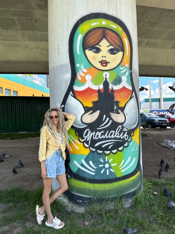 Woman in yellow shirt spotted across Russian towns during morning