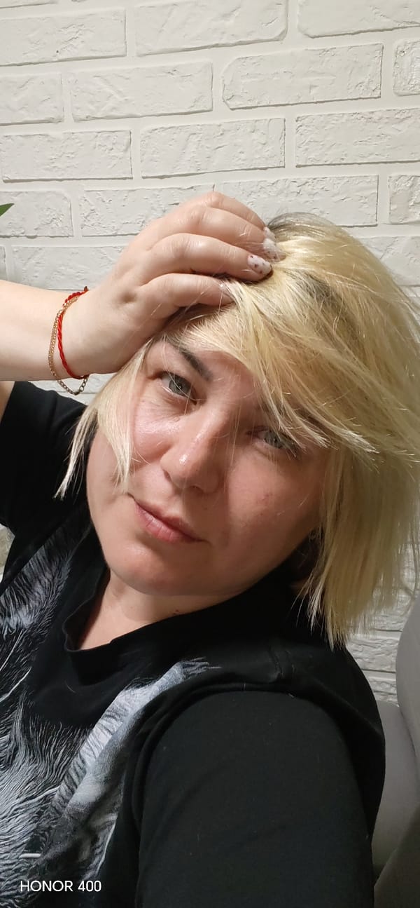 Woman takes selfie in Noviy, Russia