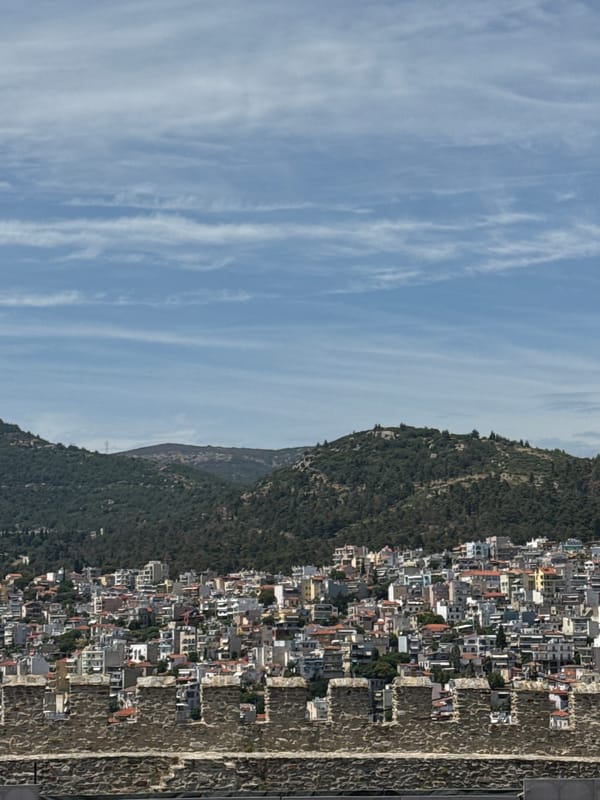 Coastal city views from atop historic stone fortification walls
