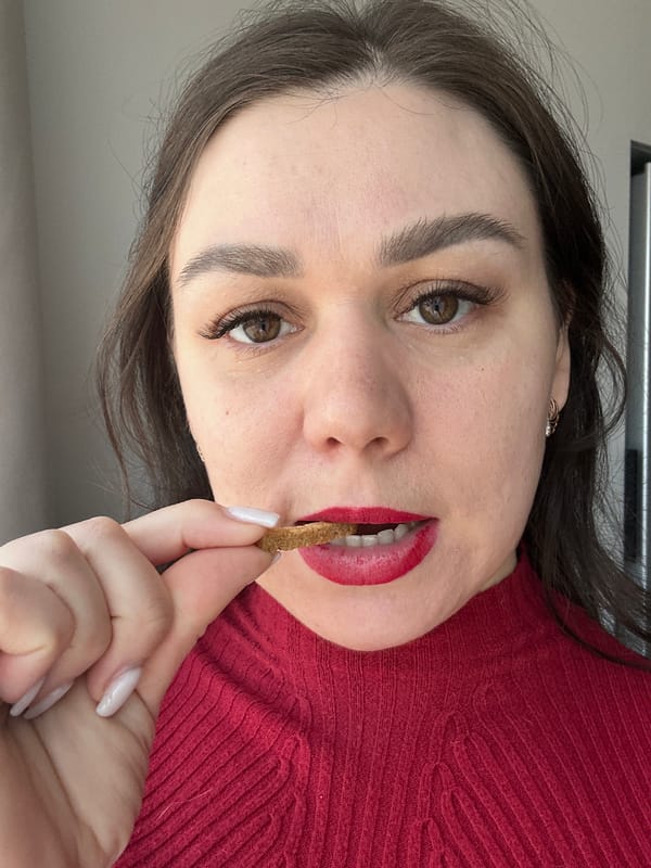 Woman enjoys desk snack in Chaikovsky, Russia