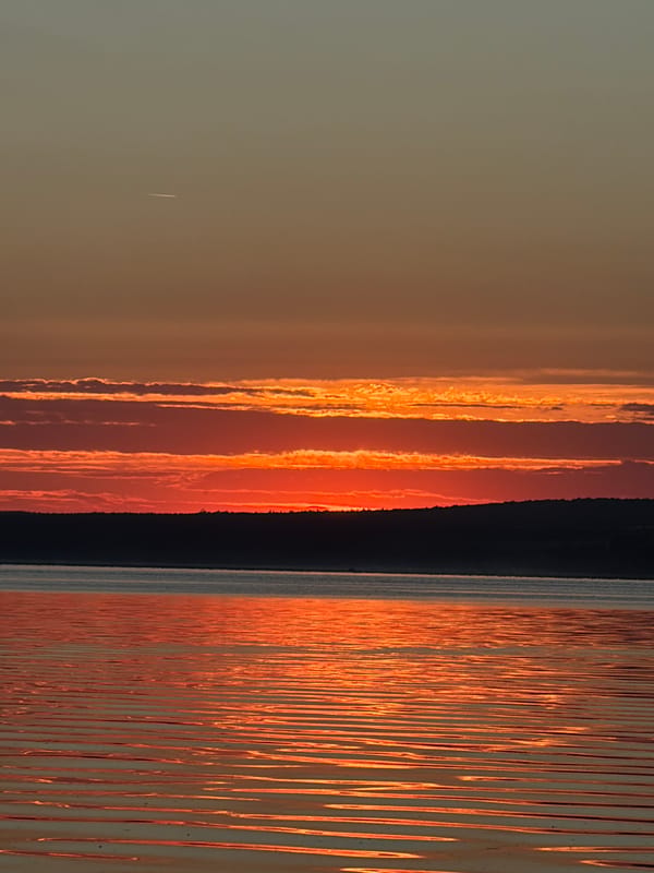 Sunset fishing on the Chaikovsky waterfront