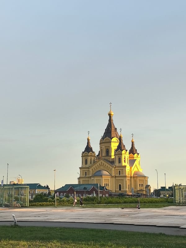 Nizhny Novgorod waterfront at sunset, stages and construction underway