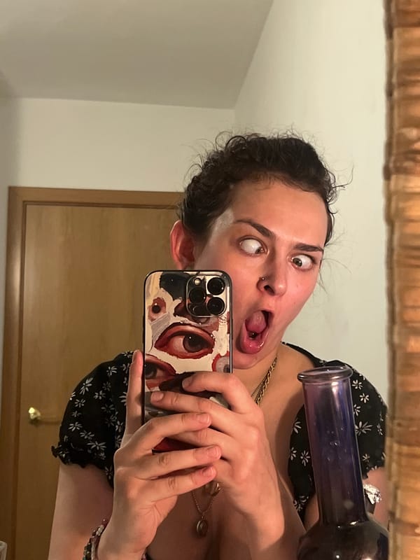 Woman Takes Multiple Mirror Selfies in Picassent, Spain