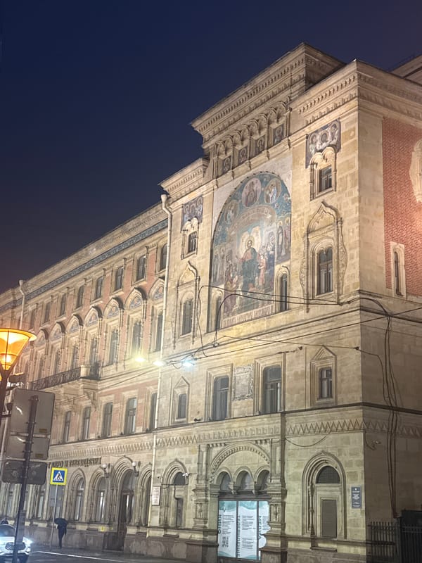 Nighttime architectural tour documented across rainy Saint Petersburg