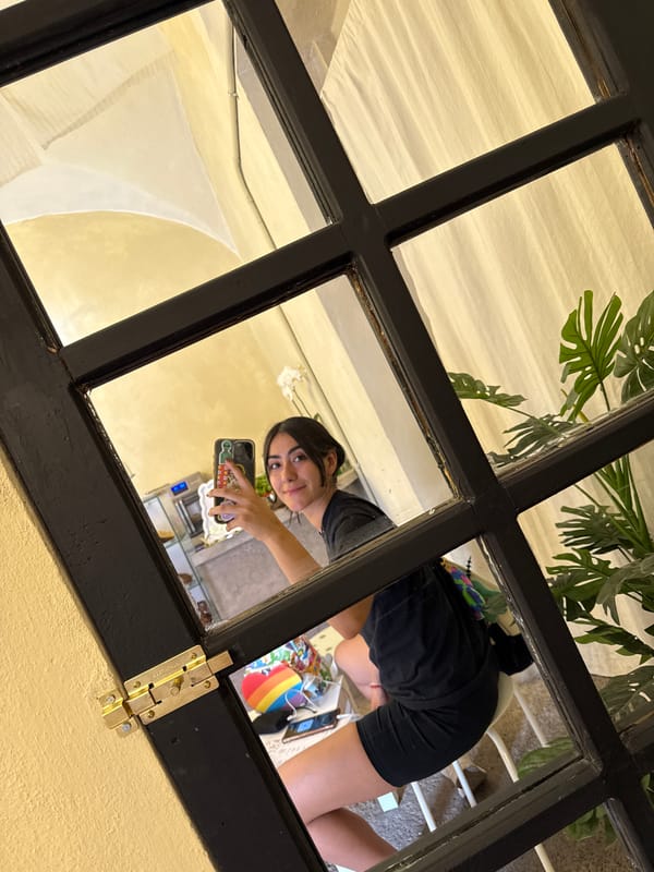 Woman takes mirror selfie in Puebla, Mexico