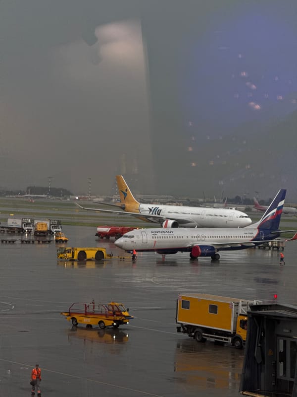 Rainy afternoon at Sheremetyevo Airport with aircraft operations