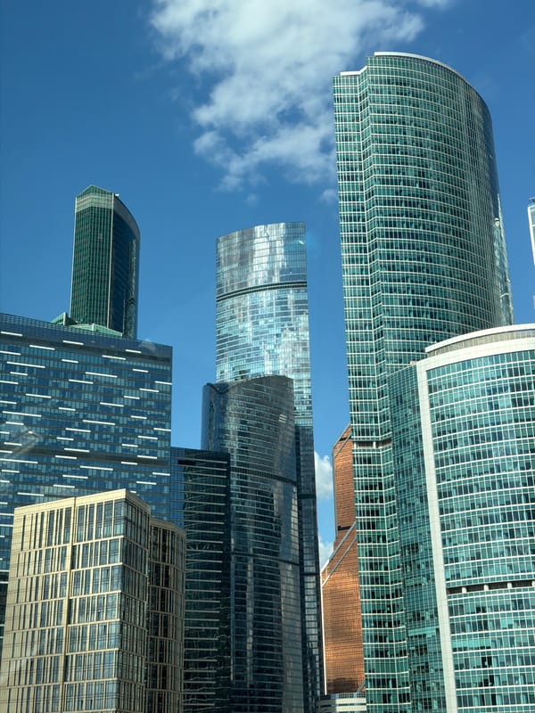Modern city skyline from multiple angles, clear day