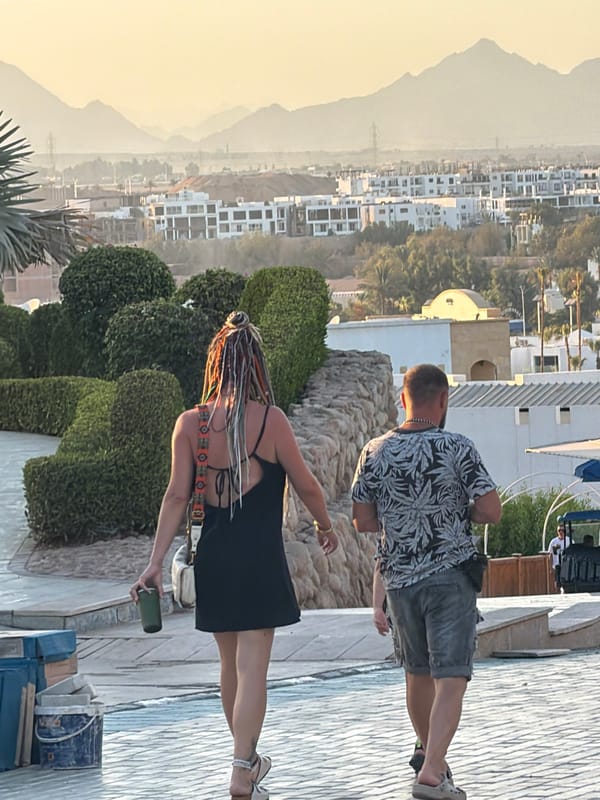 Poolside activity at a Sharm El Sheikh resort on a sunny afternoon