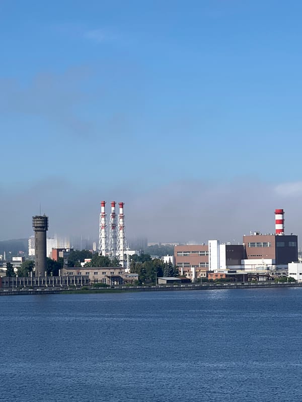 Izhevsk reservoir embankment on a calm summer morning