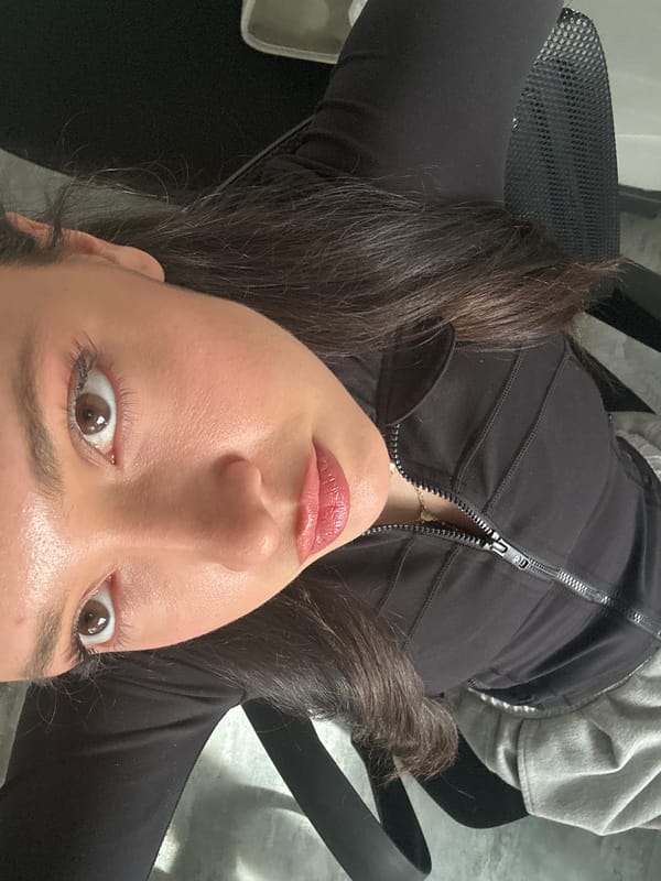 Woman documents outfit changes in Zovuni Armenia photoshoot session