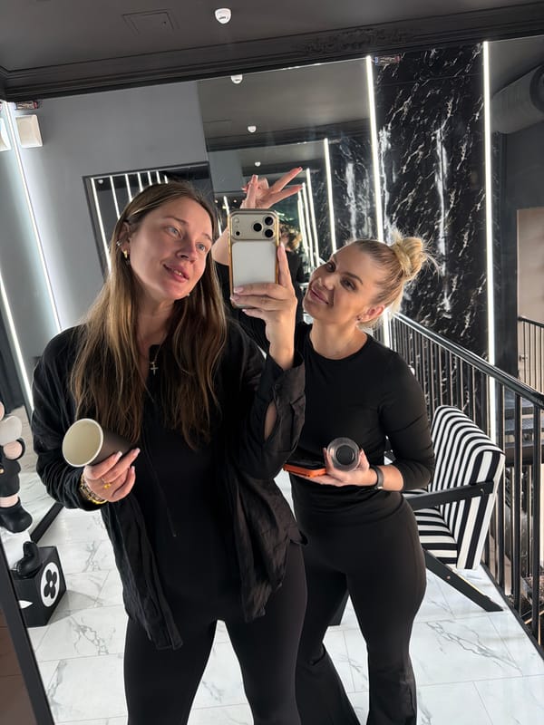 Women take selfies at boutique in Shcherbinka, Russia