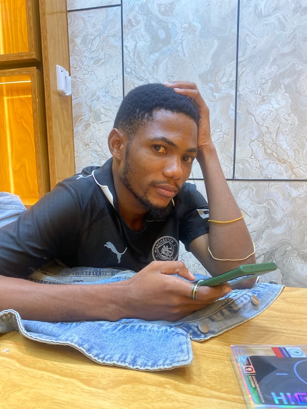 Man shops for electronics at Dar es-Salaam mobile store