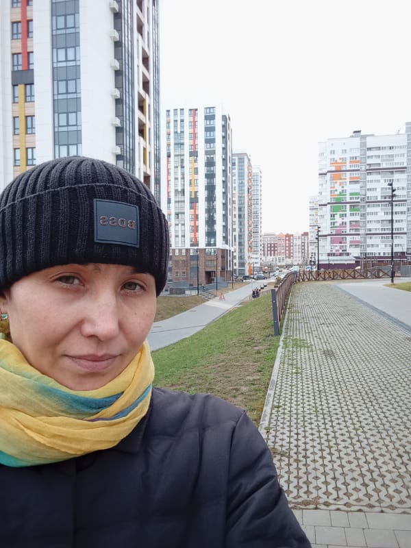 Person in BOSS beanie photographed on Izhevsk street