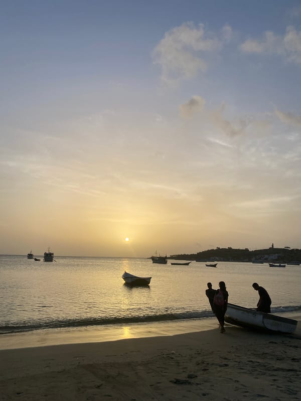 Boats, beach, and a golden sunset in Juan Griego