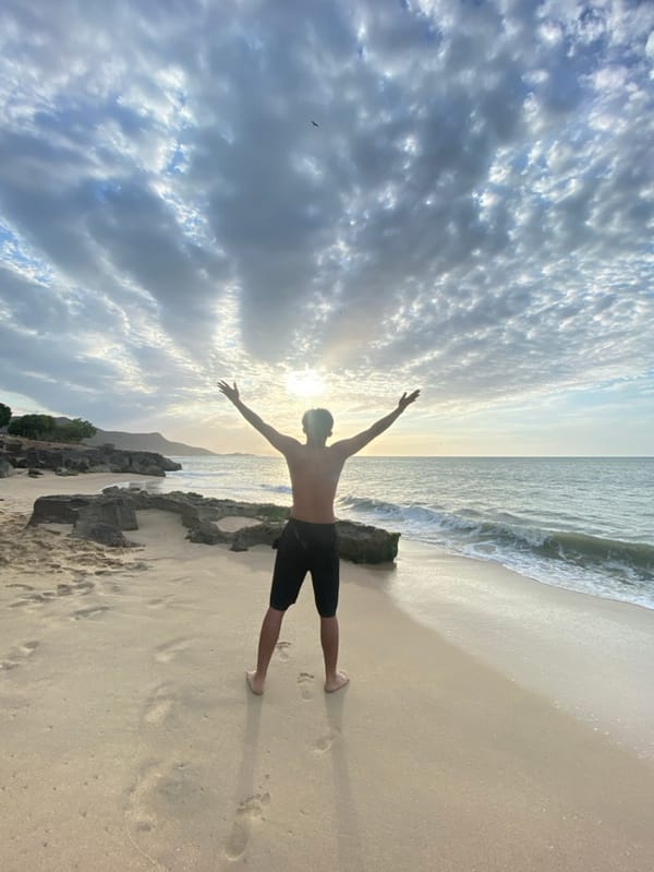 Evening beach activities captured at Juan Griego, Venezuela sunset