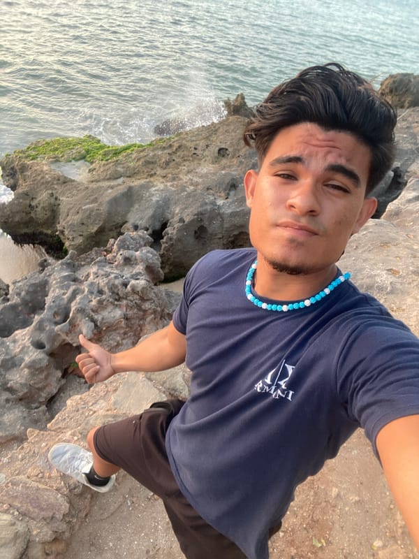 Sunset seascape captured with silhouetted figure in Juan Griego