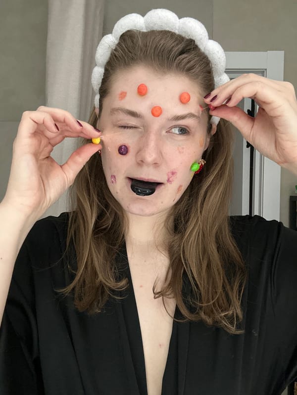 Woman documents colorful face treatment routine in Kazan bathroom